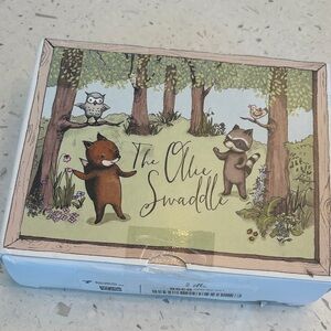 New in Box Blue Ollie Swaddle